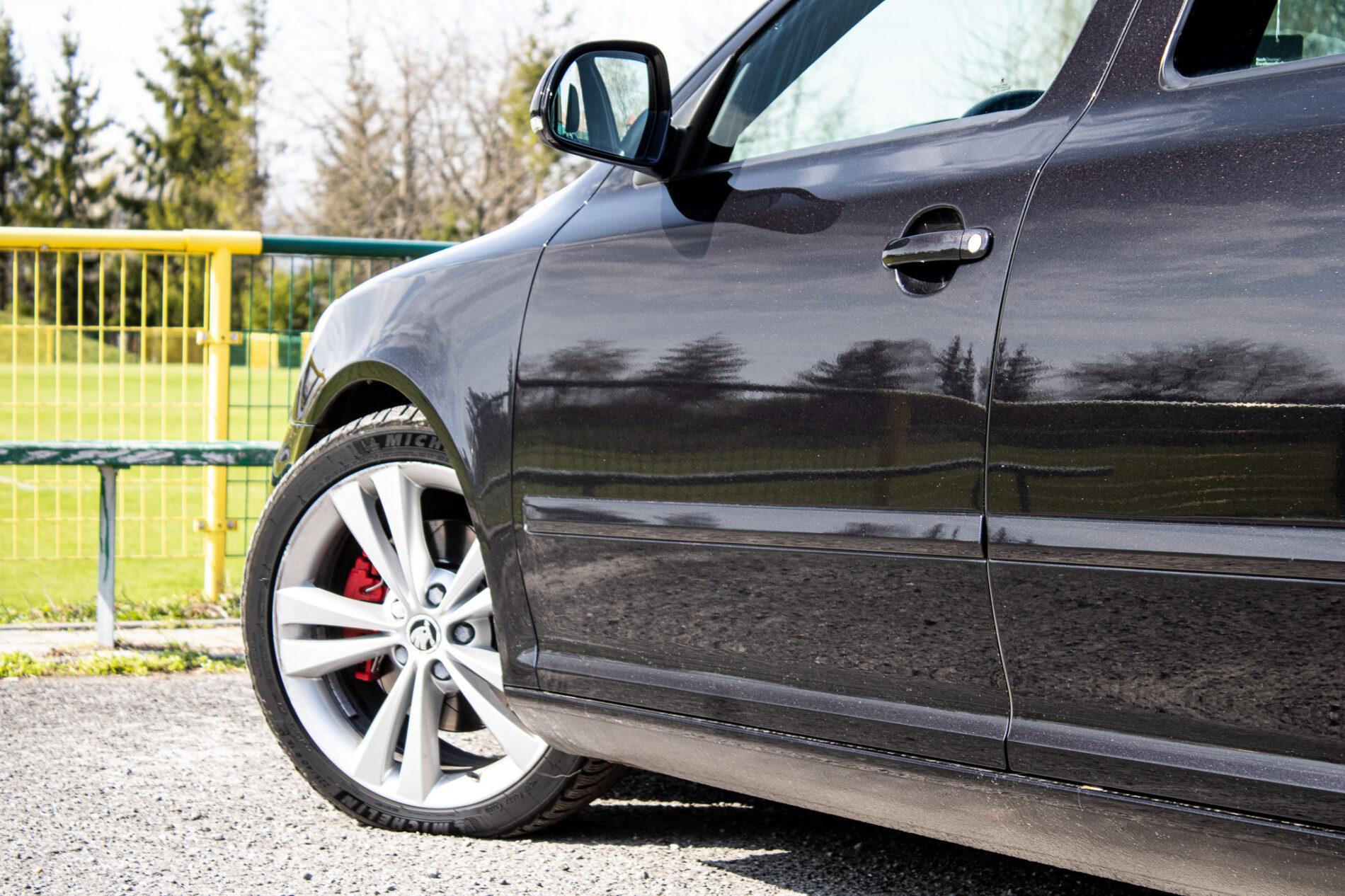 2011 Skoda Octavia RS, černá kombi, 190 807 km