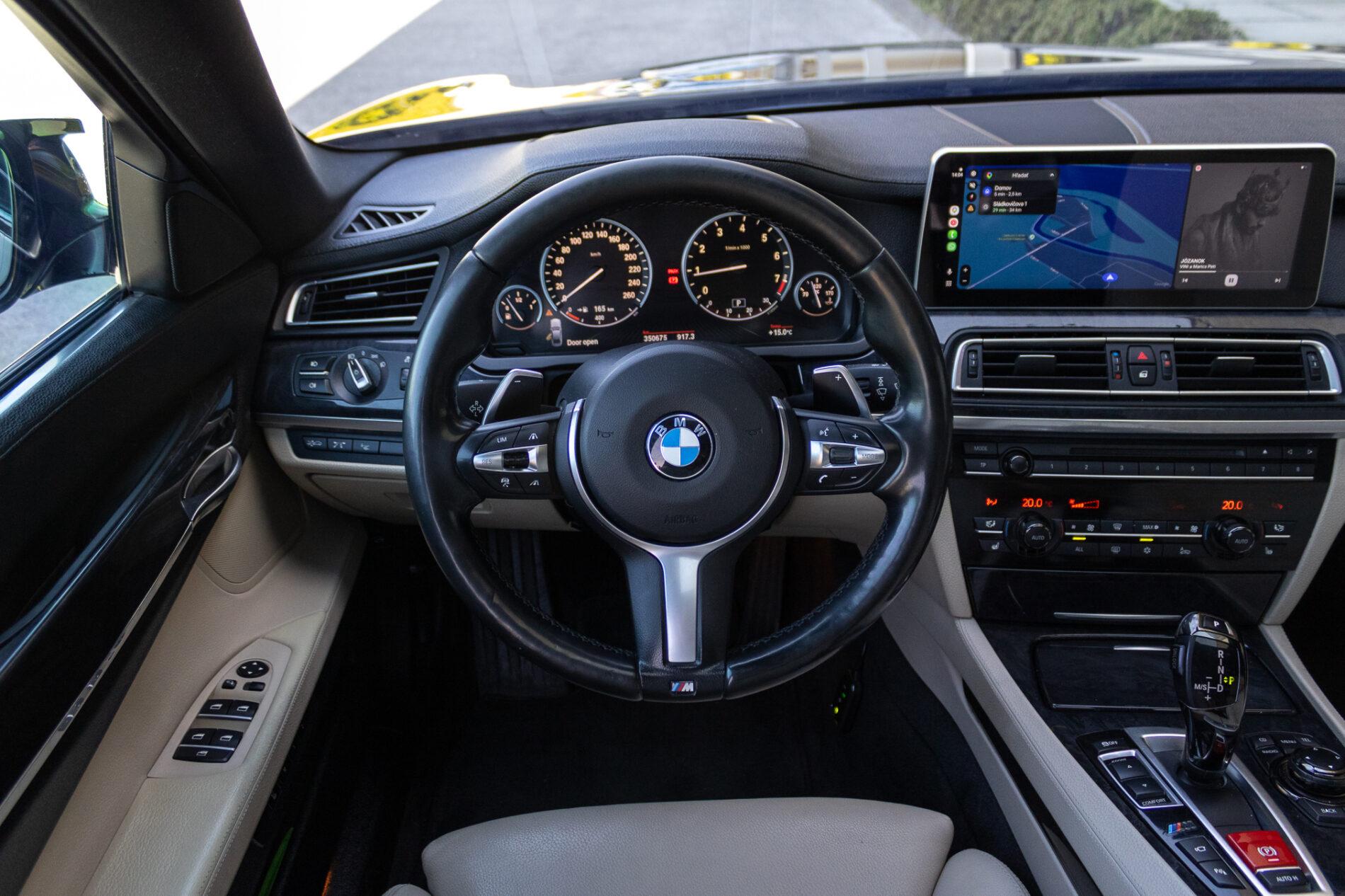 2009 BMW 740i, černá sedan, 350 675 km