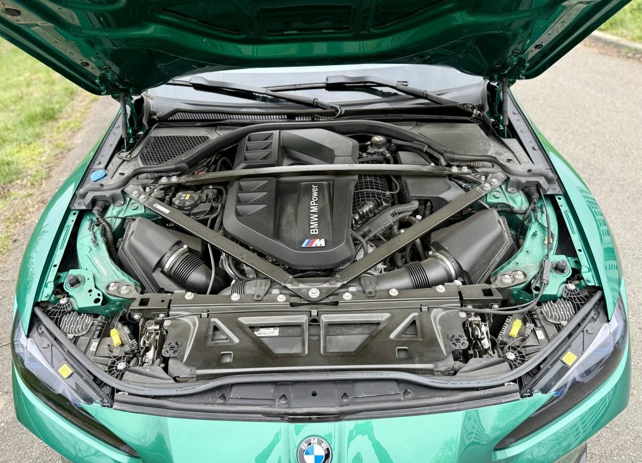 2021 BMW M4, tmavě zelená kupé, 50 600 km